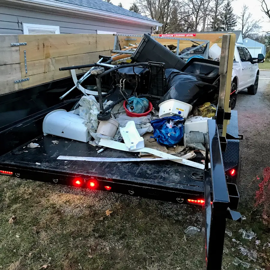 Roll-off dumpster delivered to a residential driveway in The Crossings