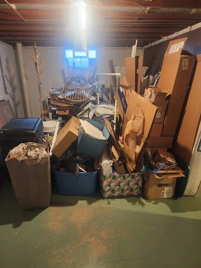 Roll-off dumpster container at job site for Construction Dumpster Rental in The Crossings